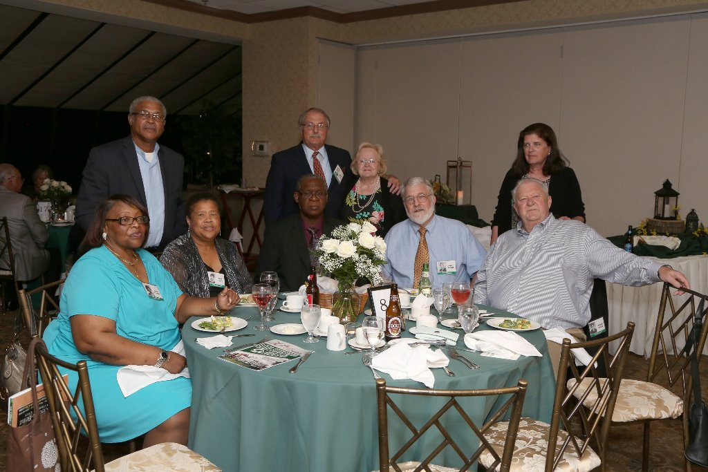 LBHS(252) Table 8 - Sitting - Anita Williams, Dorris Gillis-Fields, Mr. Fields, Carl Larson, Bob Guice, Standing -Edward Winrow, Fred Baetig, Mrs. Baetig, Jannis Flanagan