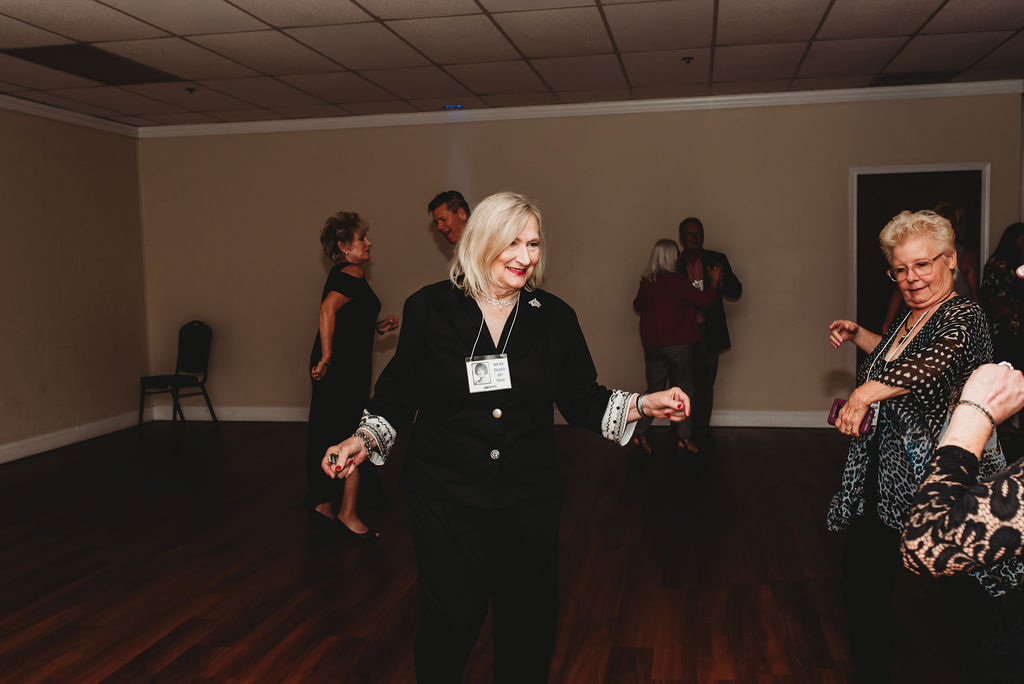 Center Front: Jane Byers; Right: Rosemary Henson and Cheri Verme; Background from Left: Denise Lassalle and Dave Hartley, and Terri McLain and Dan Green