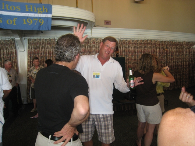 Barry Bailey talking to Rich Lyons; Jane Grossman in background.