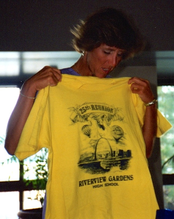 Patty Geller modeling Reunion T-Shirt designed by Steve Mendoza