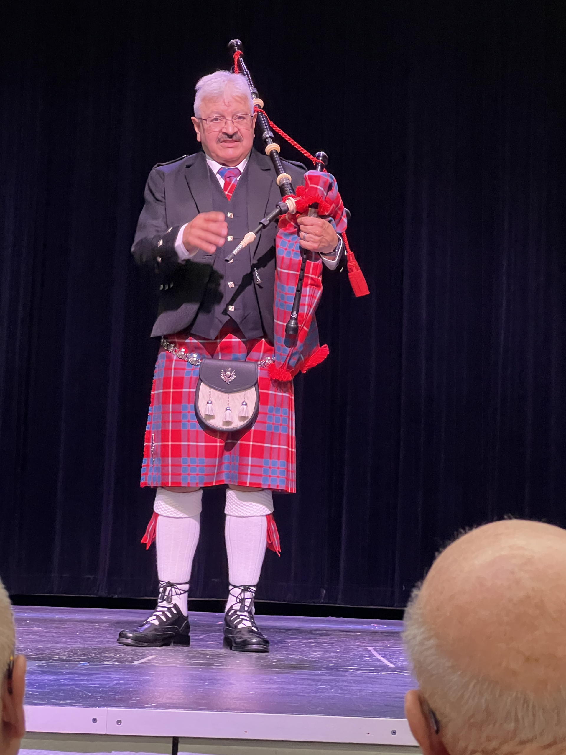 Michael Calleros '68, performing at the 2nd Annual Celebration (First male to join the BA Pipe Band)