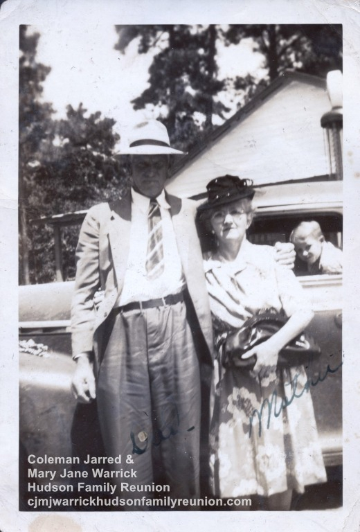 Lloyd & Mamie in front of Store
