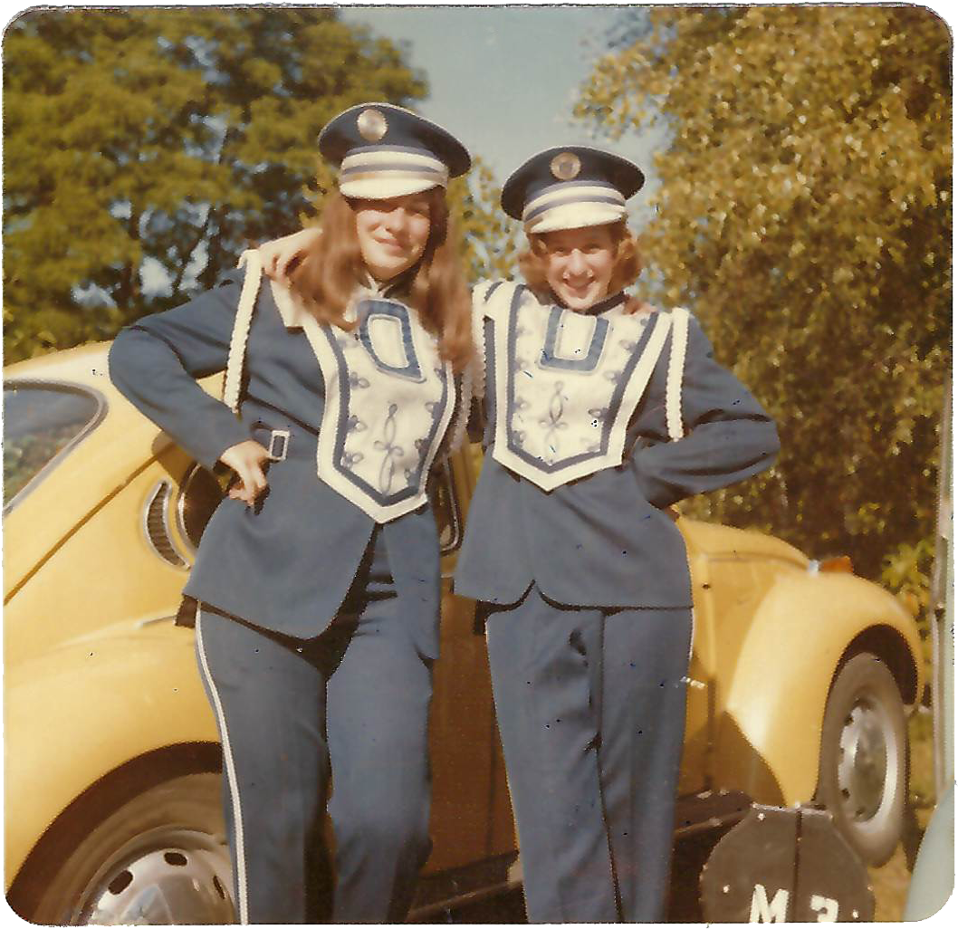 Irene Stewart and Louise Bertolin, July 1974, before the Lakefair Parade, along with Duane Duxbury's yellow VW bug.