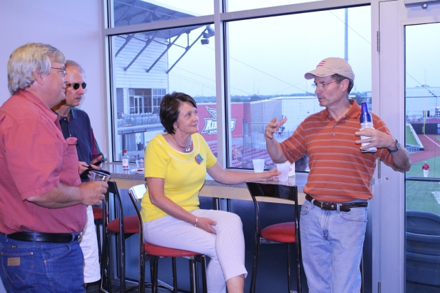 Mike Thompson was telling a BIG whopper....Sarah, Clint and Richard listening intently