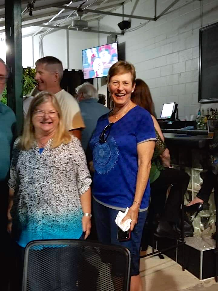 Sandy Heise and Debbie Rhoades; Background: Mark Heuckroth (RGHS 1970), Ken DeBeer, Bruce Ealick and Karen Clubb (at bar)
